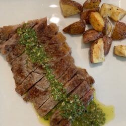 Strip steak with chimichurri and roasted potatoes