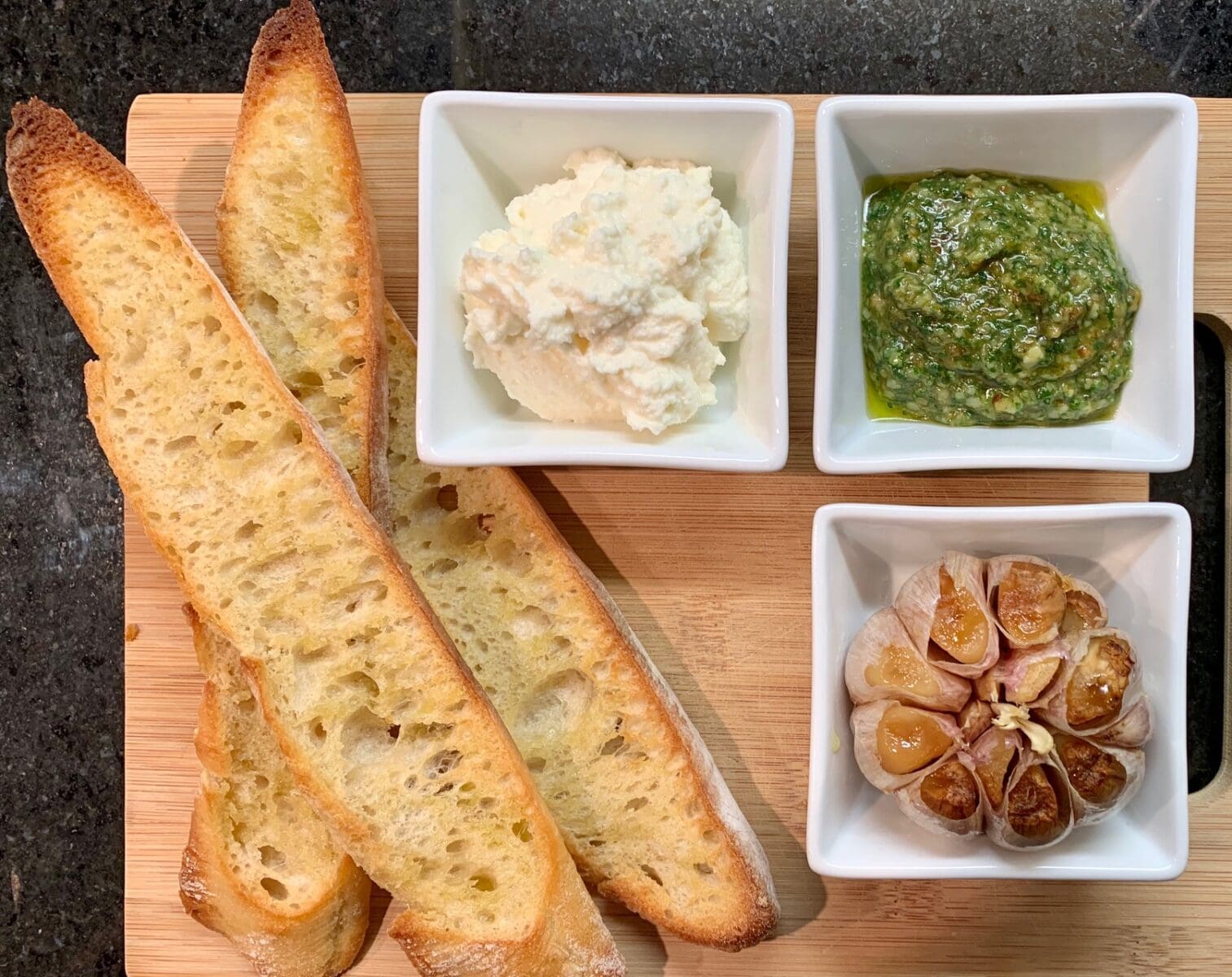 Roasted garlic with Pesto and Goat Cheese