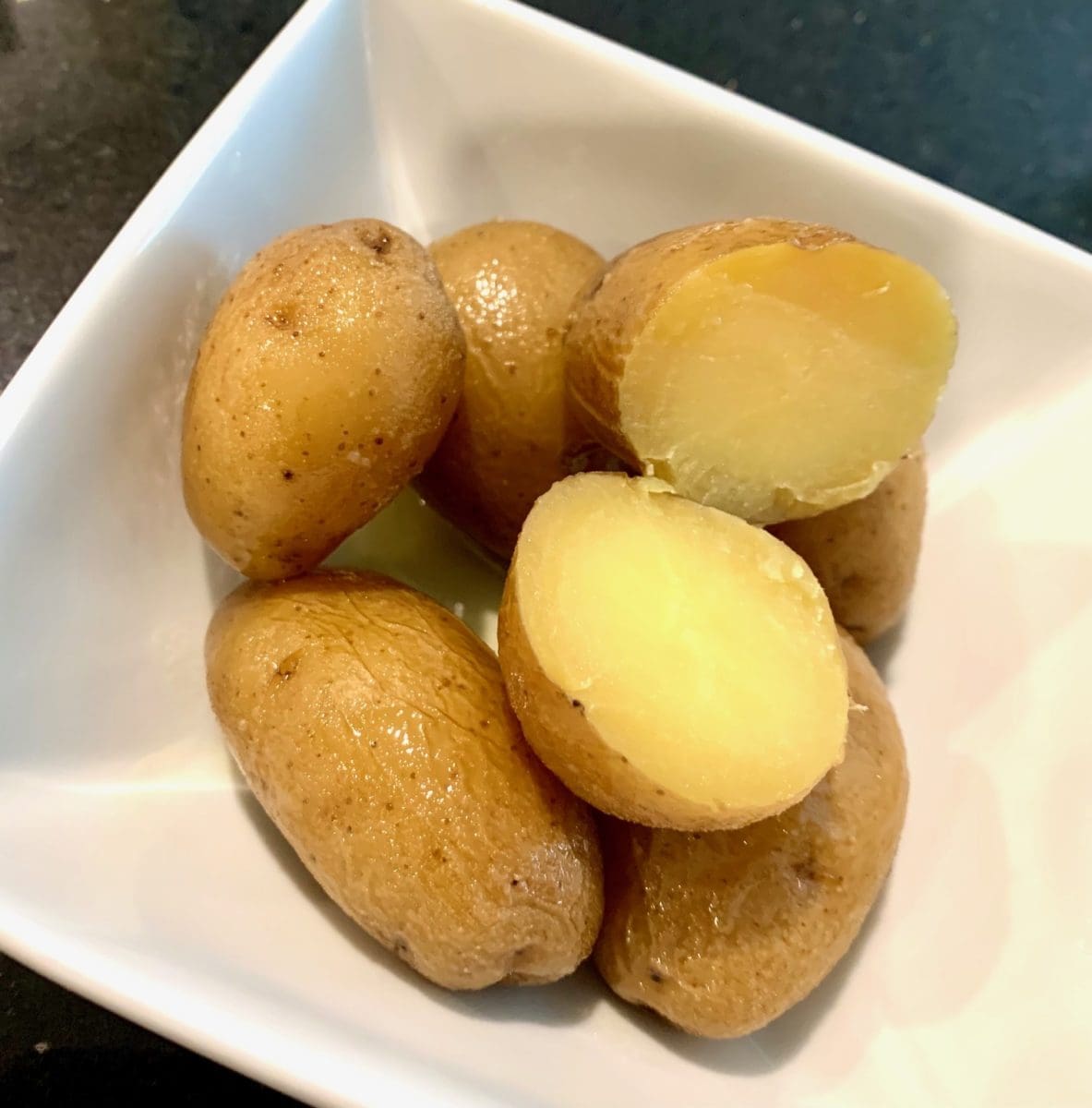 confit potatoes strained and cut
