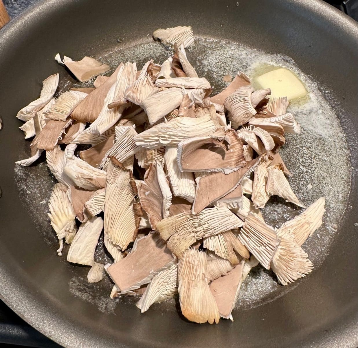 sauteeing the mushrooms