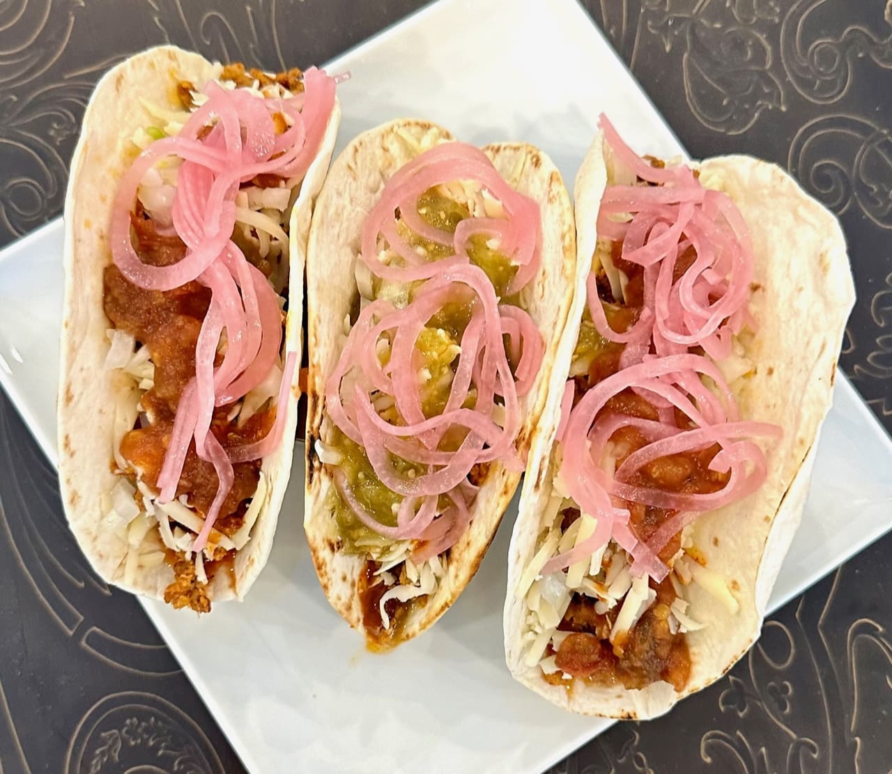 chorizo tacos and pickled red onions