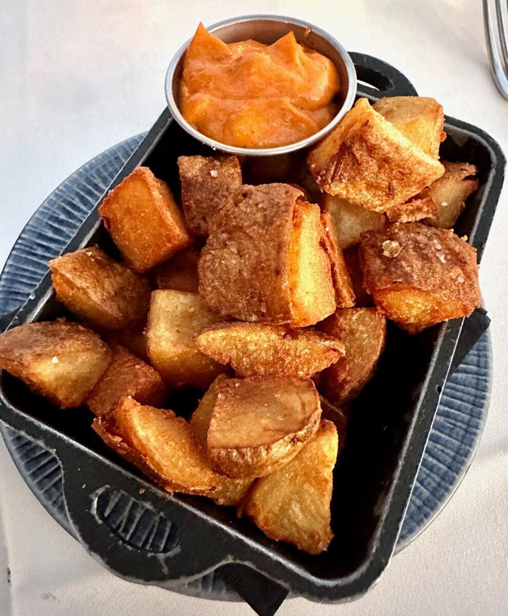 the dining room at little palm island papas bravas