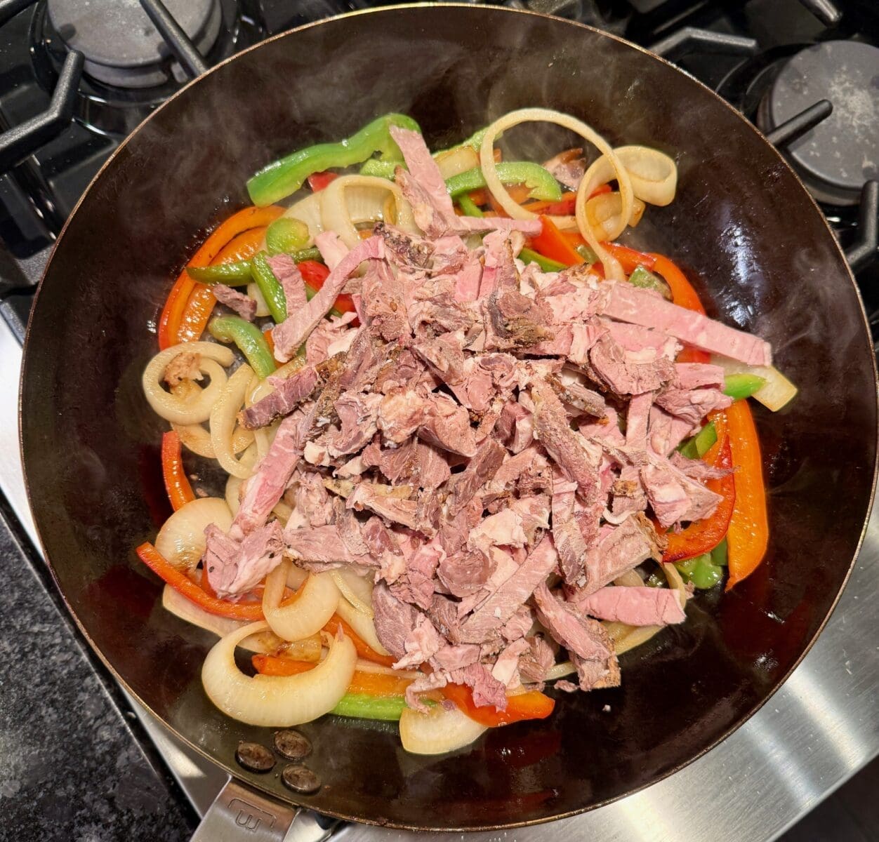 onions peppers and prime rib