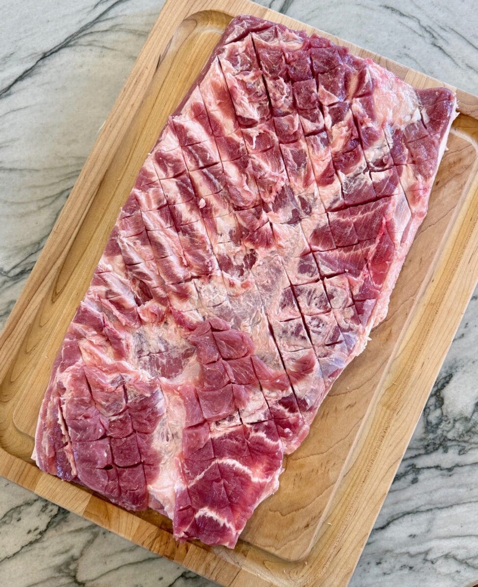 trimming and seasoning the meat